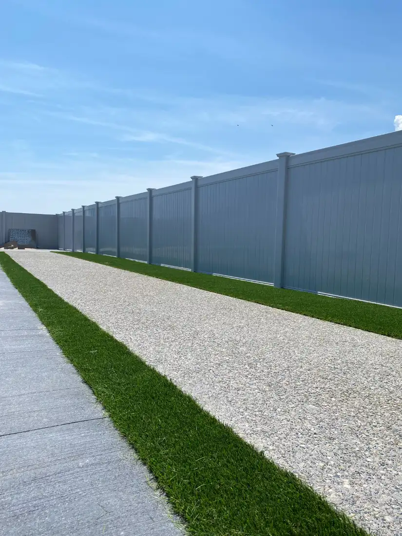 Exposed aggregate path with turf on both sides