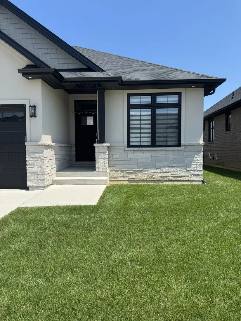 Before: bare front lawn